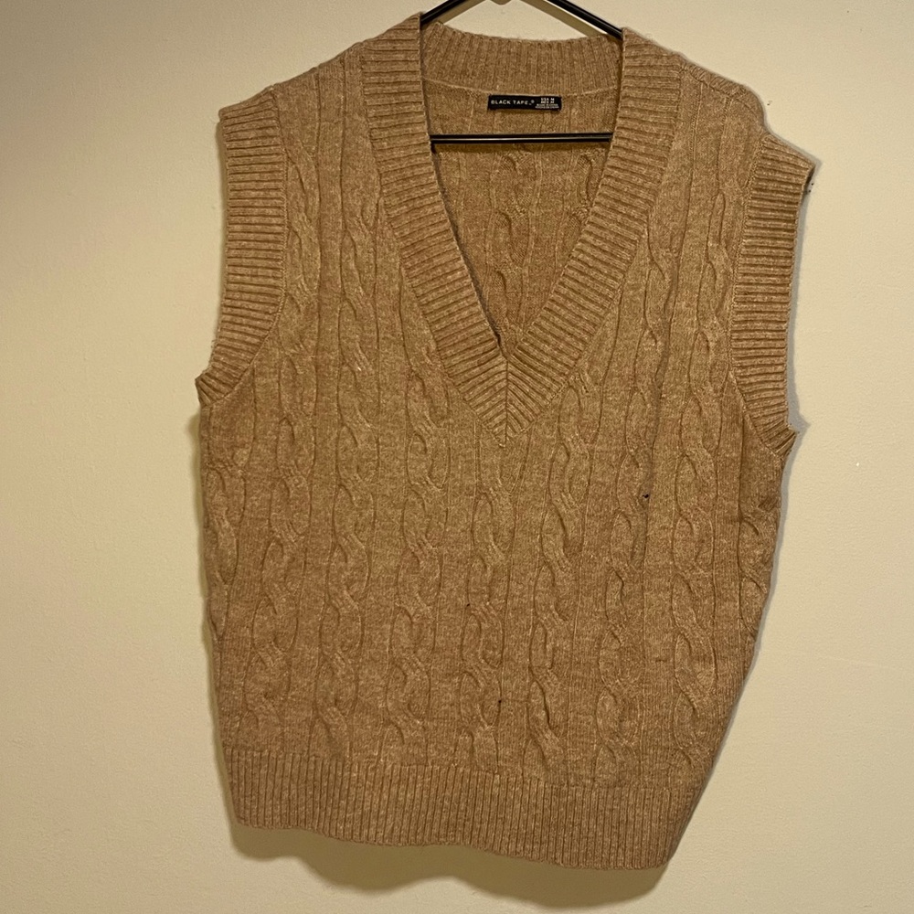 Cute V neck winter vest. Tan brown color.